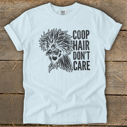 Light blue t-shirt with a chicken graphic and text "Coop Hair Don't Care".