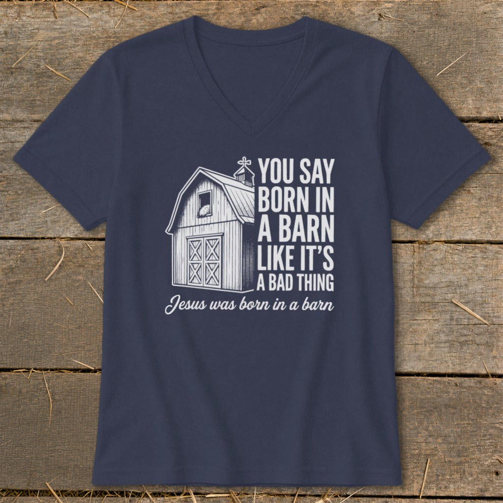 Navy v-neck t-shirt with a barn graphic and text "You say born in a barn like it's a bad thing. Jesus was born in a barn."