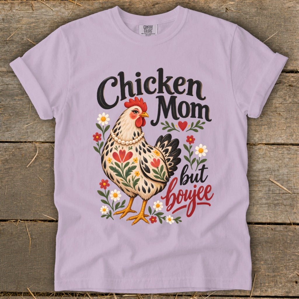 Chicken Mom but boujee graphic with a hen and flowers on a purple t-shirt.