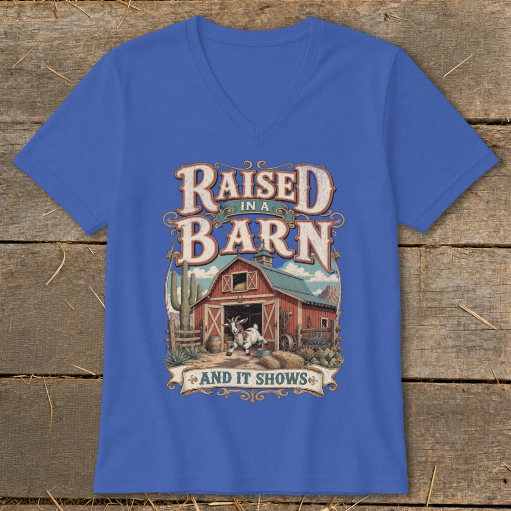 T-shirt with "Raised in a Barn And It Shows" text and goat illustration.