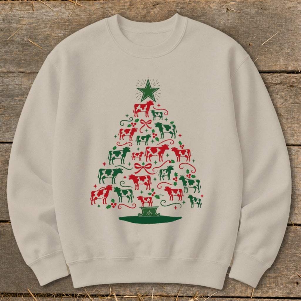 Cream crewneck sweatshirt with Christmas tree design made of red and green cows.