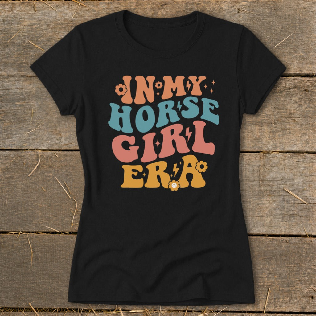 Black t-shirt with "In My Horse Girl Era" text in retro font.