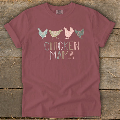 Marrón t-shirt with four patterned chickens and "CHICKEN MAMA" text.