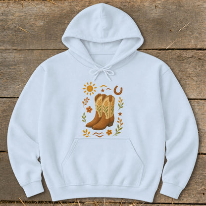 Light blue hoodie with western boots, sun, and horseshoe graphic.