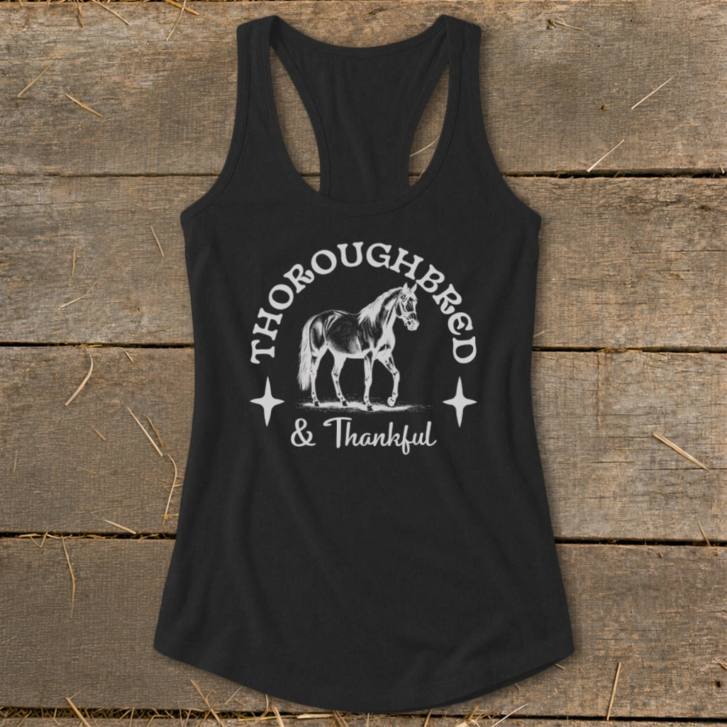 Black racerback tank top with white "Thoroughbred & Thankful" text and horse graphic.
