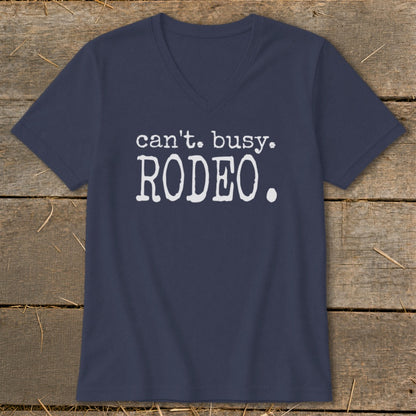 Navy v-neck t-shirt with white text that reads "can't. busy. RODEO."