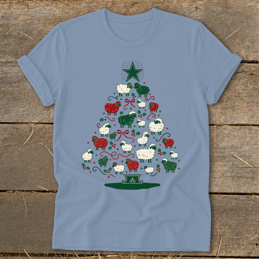 Light blue t-shirt with a Christmas tree made of sheep and holly decorations.
