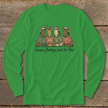 Four horses wearing Santa hats and festive sweaters, with "Seasons Greetings from the Herd" text.