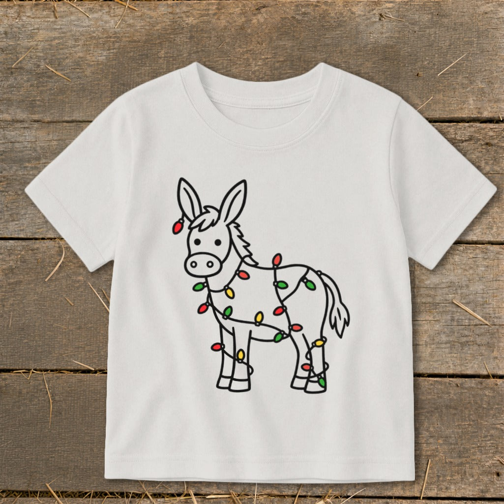 White t-shirt with a black outline cartoon donkey covered in colorful Christmas lights.