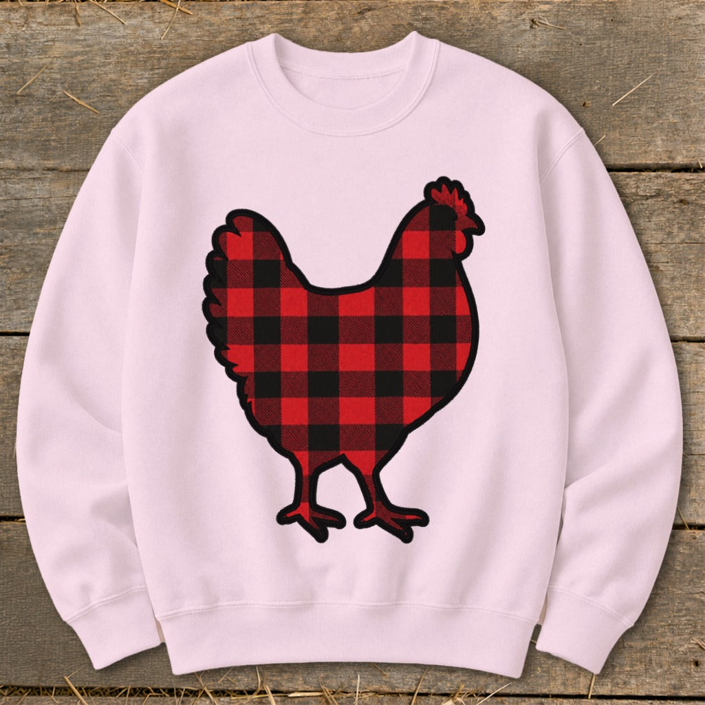 Pink crewneck sweatshirt with a red and black buffalo plaid chicken graphic.
