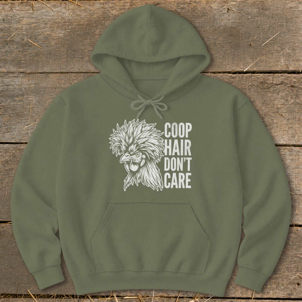 Olive green hoodie with white graphic of a chicken and text "COOP HAIR DON'T CARE".