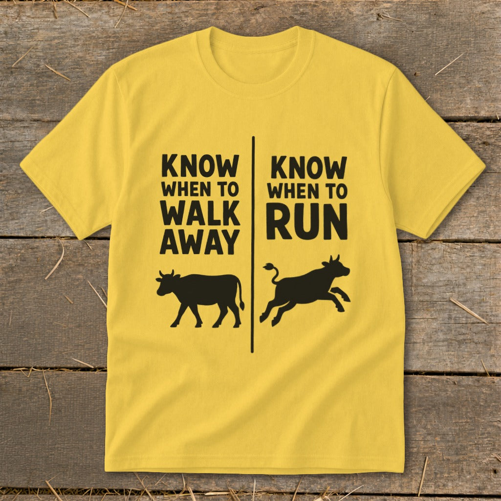 Yellow t-shirt with black text and cow silhouettes: "Know When to Walk Away" and "Know When to Run".