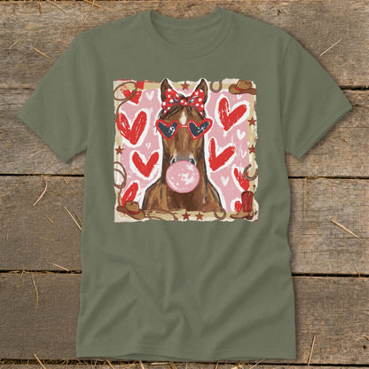 Horse wearing heart sunglasses and bow, blowing bubblegum, with hearts and western accents.