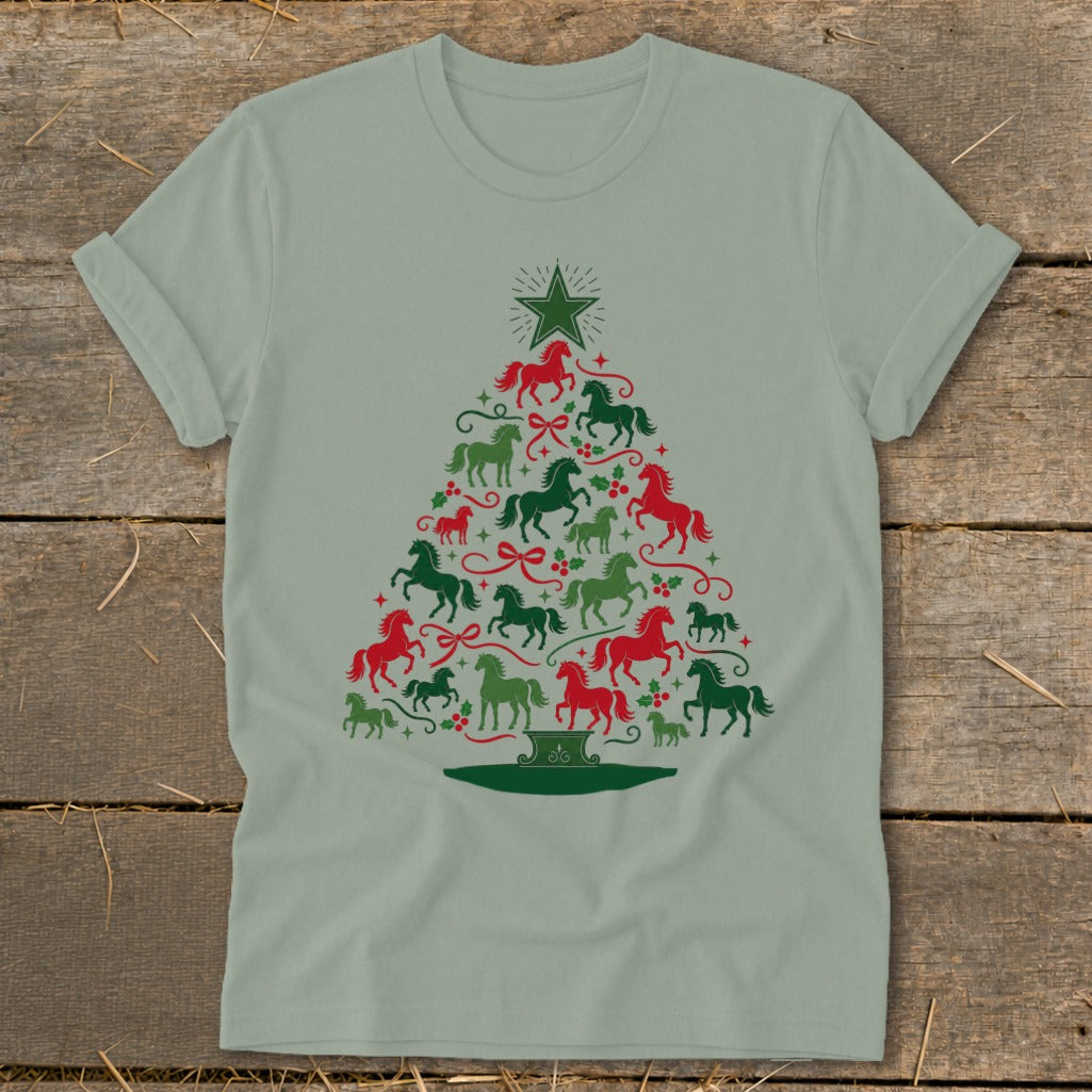 Green t-shirt with a Christmas tree made of red and green horses and holly.