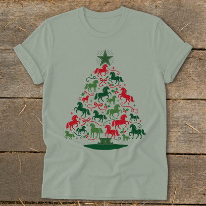 Green t-shirt with a Christmas tree made of red and green horses and holly.