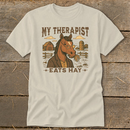 Graphic of a horse with glasses eating hay, "My Therapist Eats Hay" text.