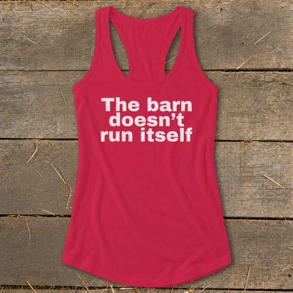 Red racerback tank top with white text "The barn doesn't run itself".