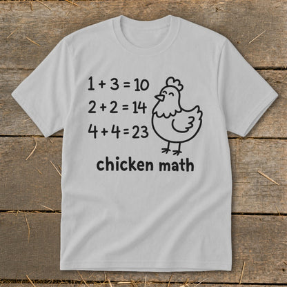 White t-shirt with black text and chicken graphic saying "chicken math".