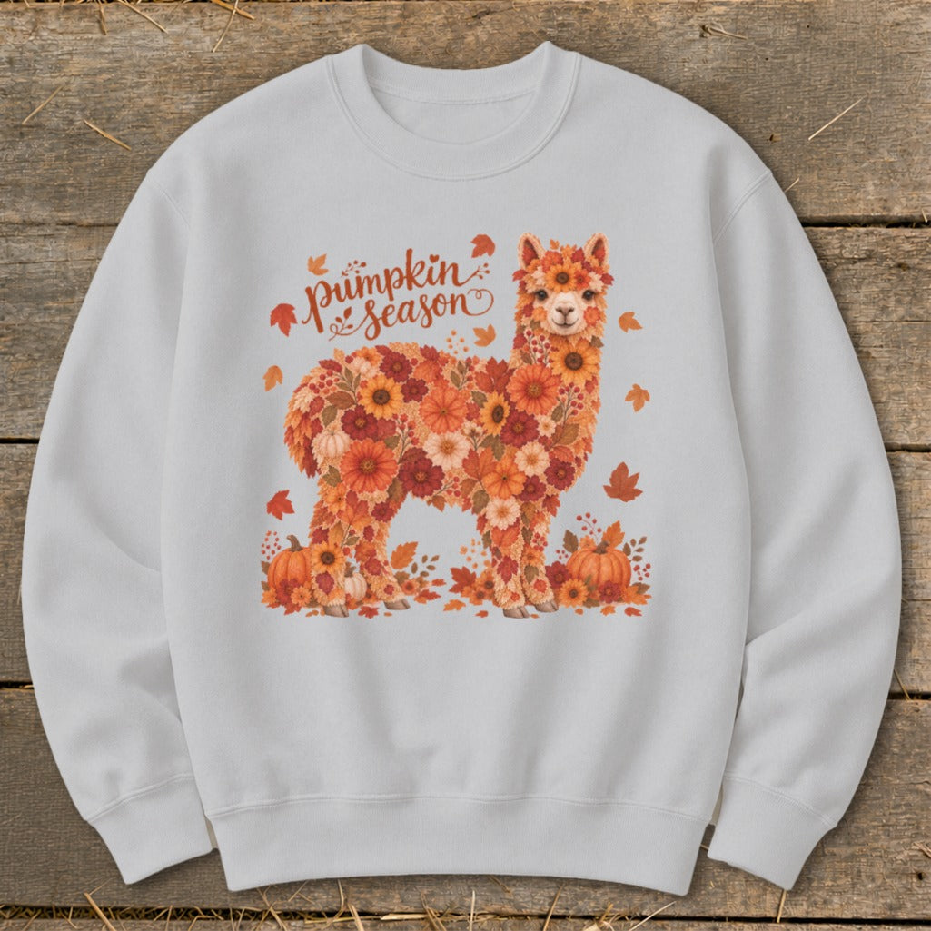 Alpaca covered in flowers and leaves with "Pumpkin Season" text.