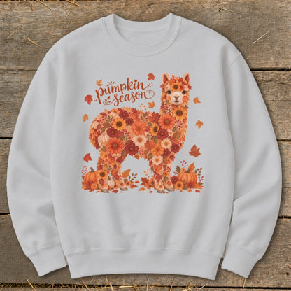 Alpaca covered in flowers and leaves with "Pumpkin Season" text.