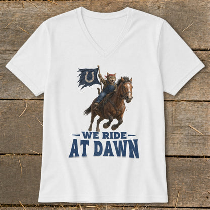 White t-shirt with a cat riding a horse, holding a blue horseshoe flag, text reads "We Ride At Dawn."