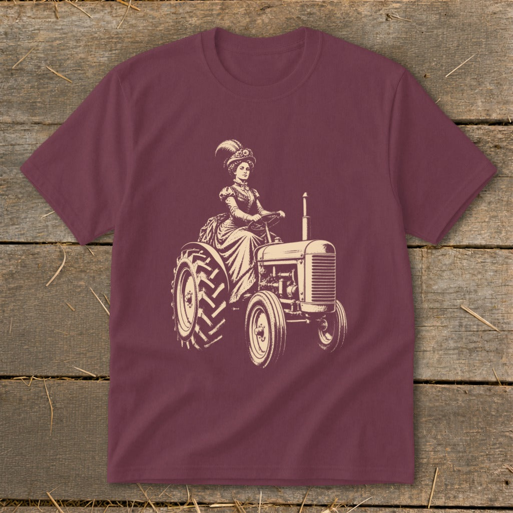 Woman in vintage dress and hat driving a tractor.