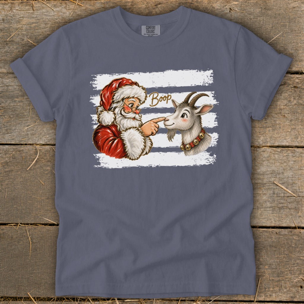 Santa booping a goat's nose with the word "Boop" written above.