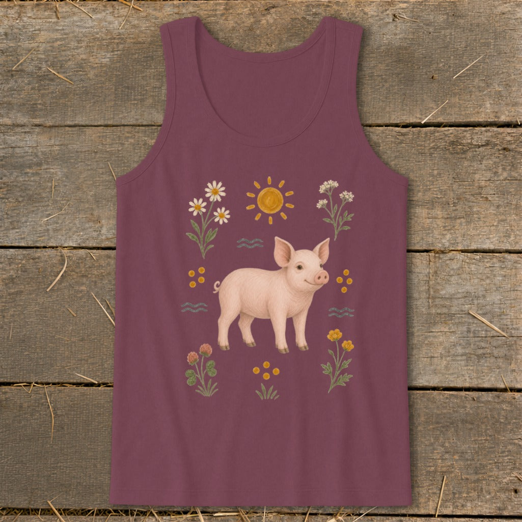 Burgundy tank top with a smiling pig surrounded by flowers and sun.
