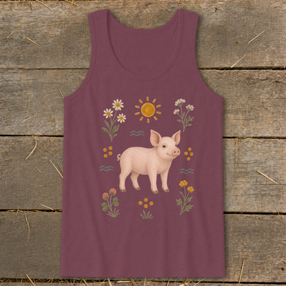 Burgundy tank top with a smiling pig surrounded by flowers and sun.