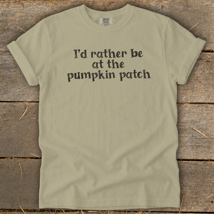 Tan t-shirt with black text that reads "I'd rather be at the pumpkin patch."