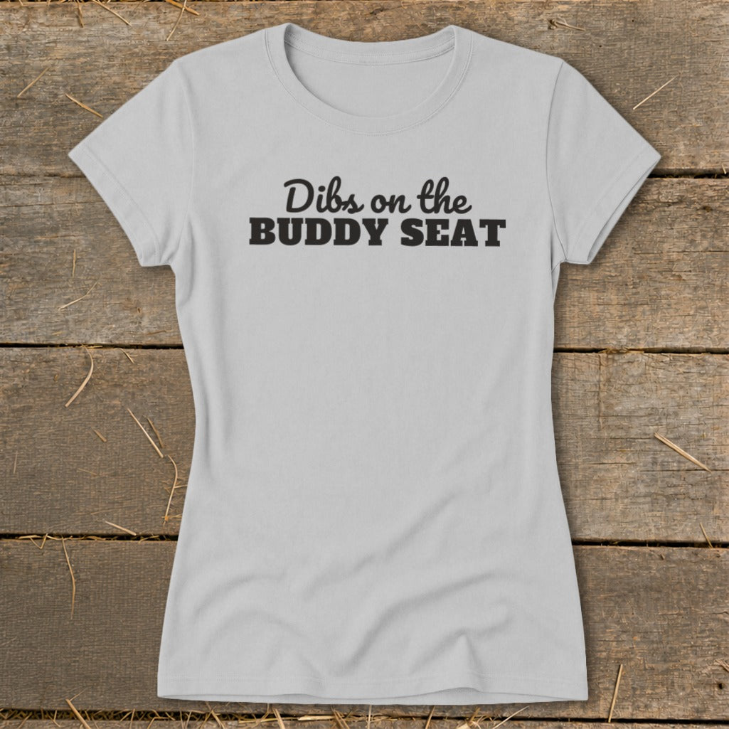 Light grey t-shirt with "Dibs on the BUDDY SEAT" in black text.