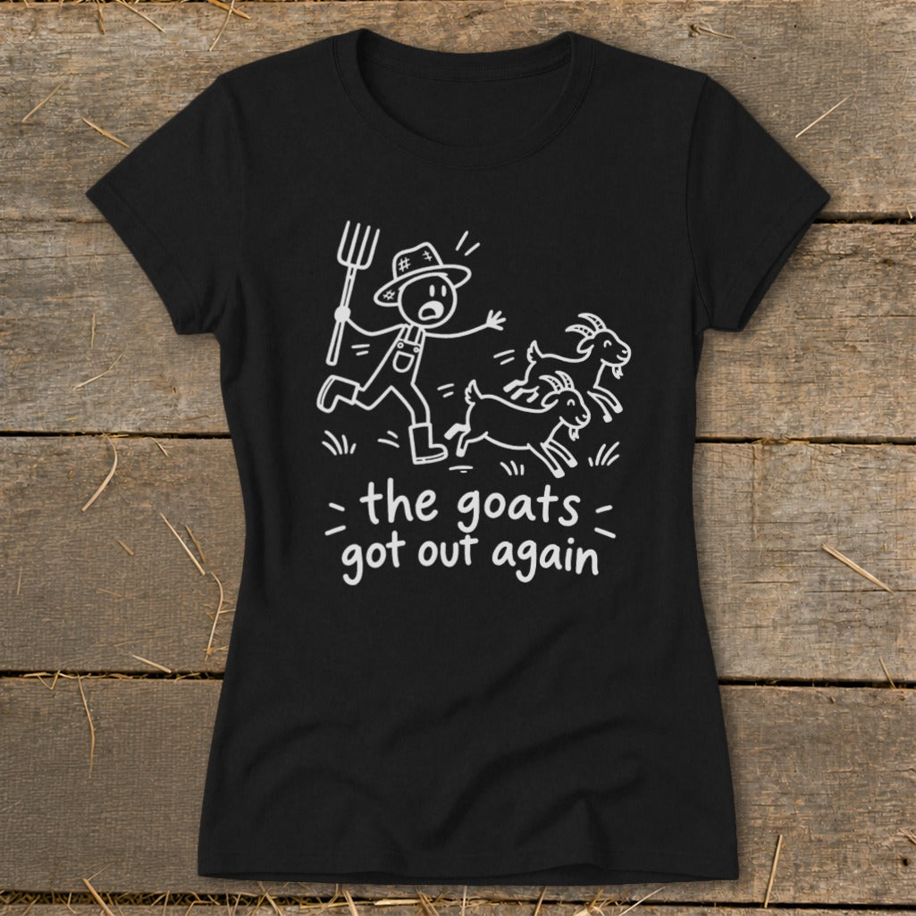 Black t-shirt with white illustration of a farmer chasing goats and text "the goats got out again".