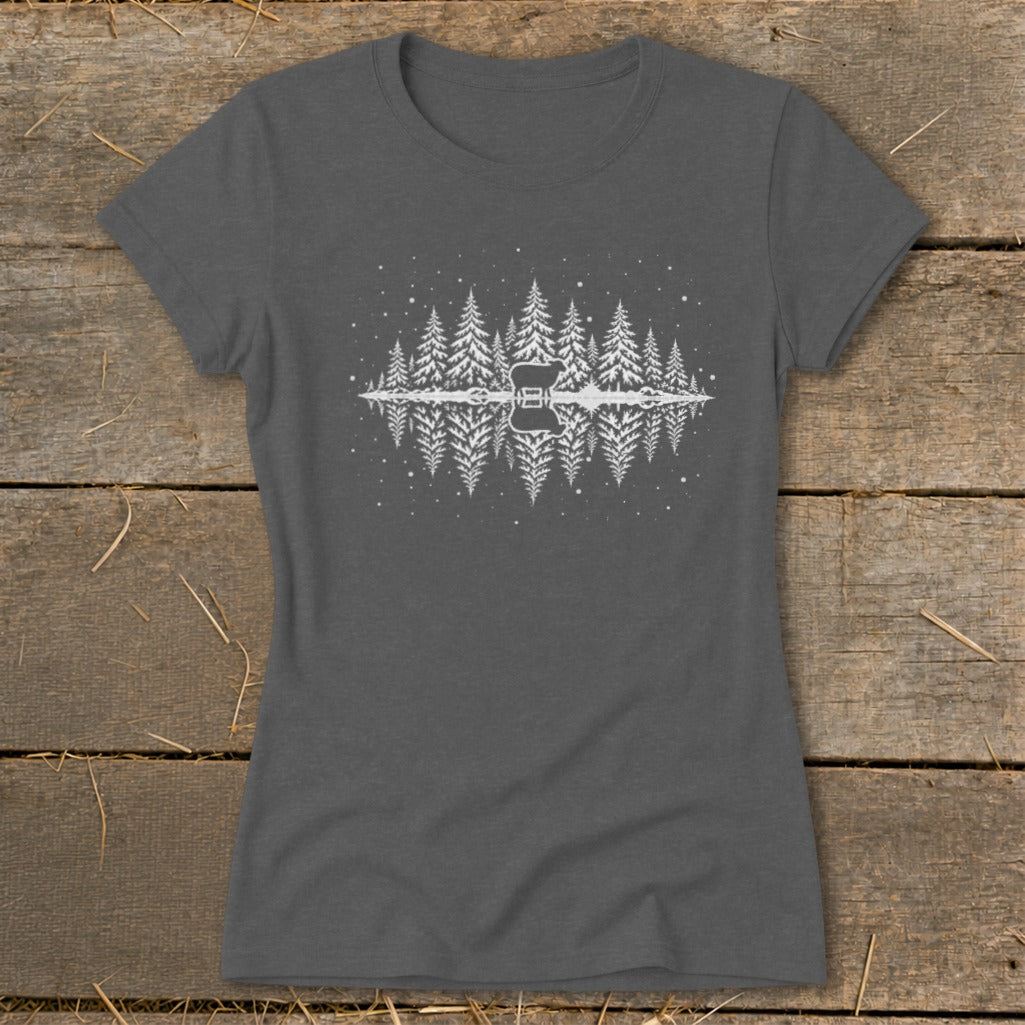 T-shirt with white graphic of pine trees, a silhouette of a deer, and reflection in water.