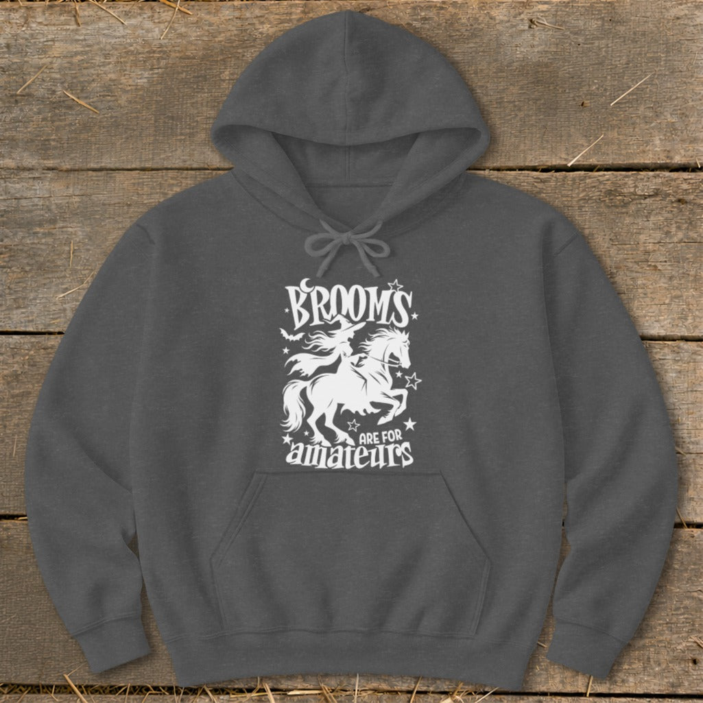 Dark gray hoodie with "BROOMS ARE FOR AMATEURS" text and witch on horse graphic.