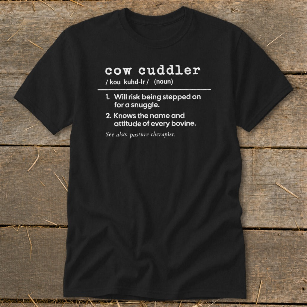 Black t-shirt with "cow cuddler" definition and "pasture therapist".