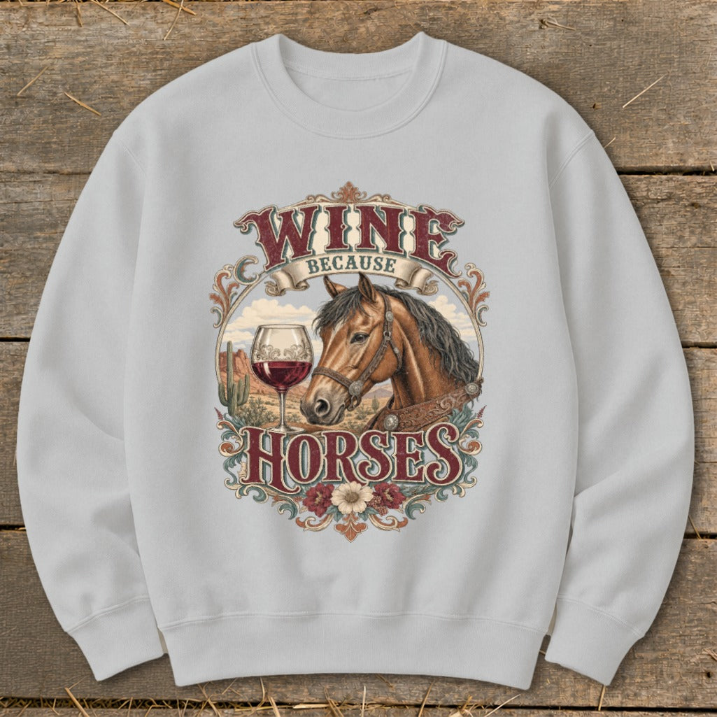 Light gray sweatshirt with "Wine Because Horses" graphic featuring a horse, wine glass, and desert landscape.