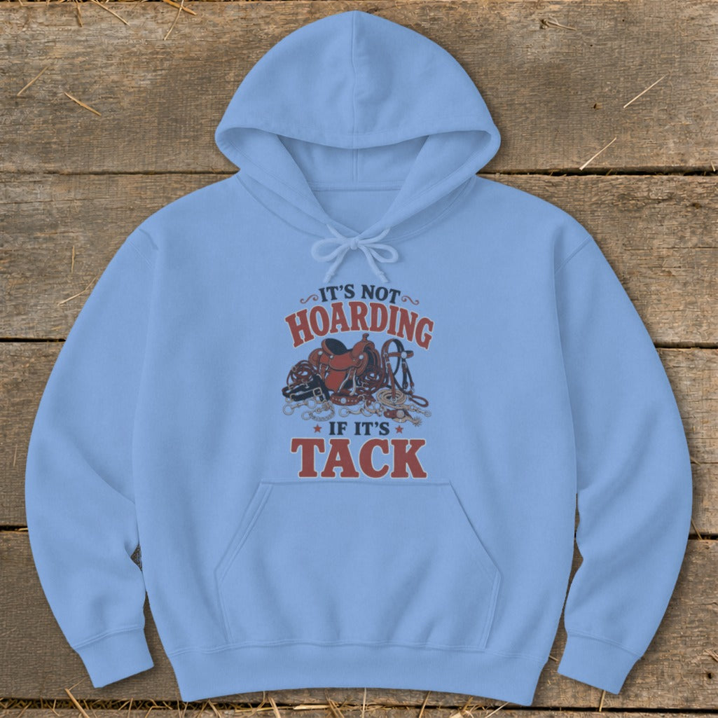 Light blue hoodie with "It's Not Hoarding If It's Tack" text and horse tack graphic.