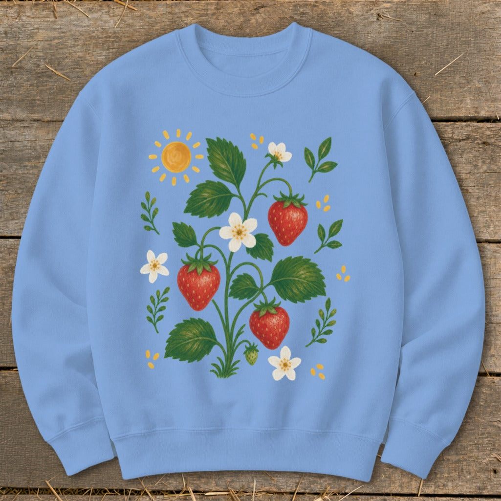Light blue sweatshirt with a whimsical strawberry plant and sun graphic.