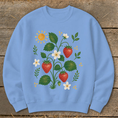Light blue sweatshirt with a whimsical strawberry plant and sun graphic.