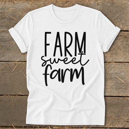 White t-shirt with "Farm sweet farm" text in black cursive and block letters.