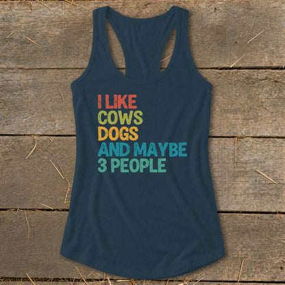Navy tank top with text "I LIKE COWS DOGS AND MAYBE 3 PEOPLE".