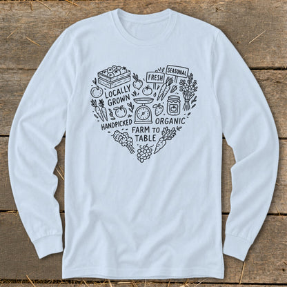 White long sleeve shirt with heart graphic of produce and text: Locally Grown, Fresh, Seasonal, Handpicked, Organic, Farm to Table.