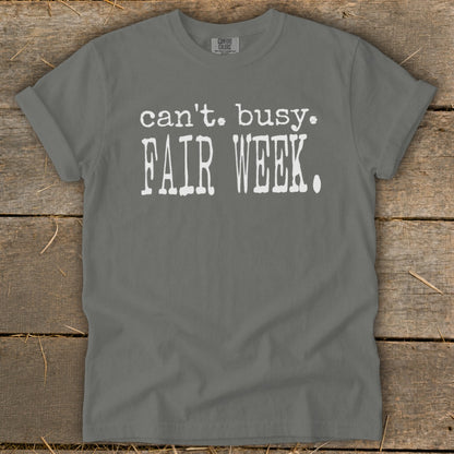 Gray t-shirt with white text that reads "can't. busy. FAIR WEEK."