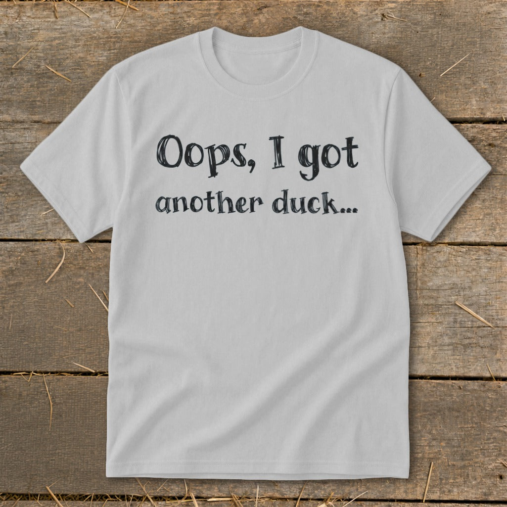 Light grey t-shirt with "Oops, I got another duck..." text.