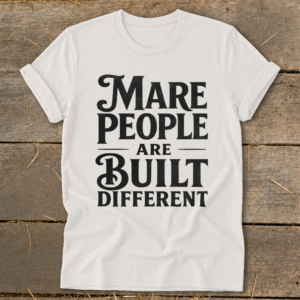 White t-shirt with black text "Mare People Are Built Different"