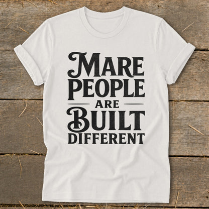 White t-shirt with black text "Mare People Are Built Different"
