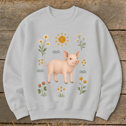 Light gray sweatshirt with a pink piglet surrounded by flowers and the sun.