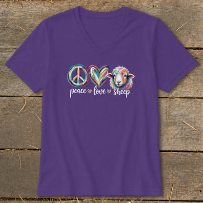 Purple v-neck shirt with peace sign, heart, and colorful sheep graphic.