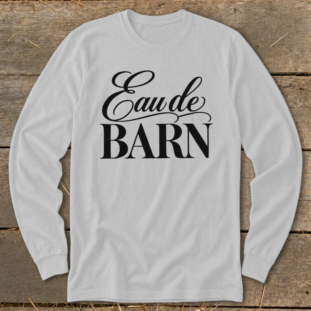 White long sleeve shirt with black text "Eau de BARN"