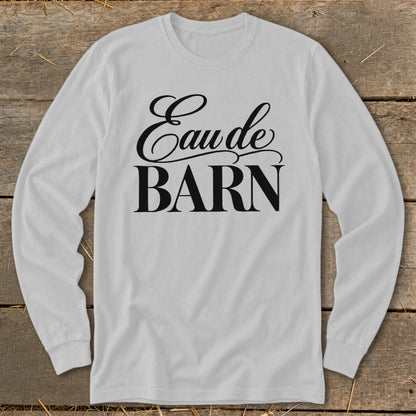 White long sleeve shirt with black text "Eau de BARN"